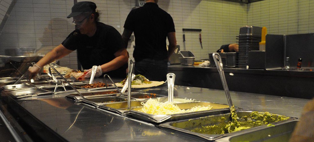 Chipotle behind the counter