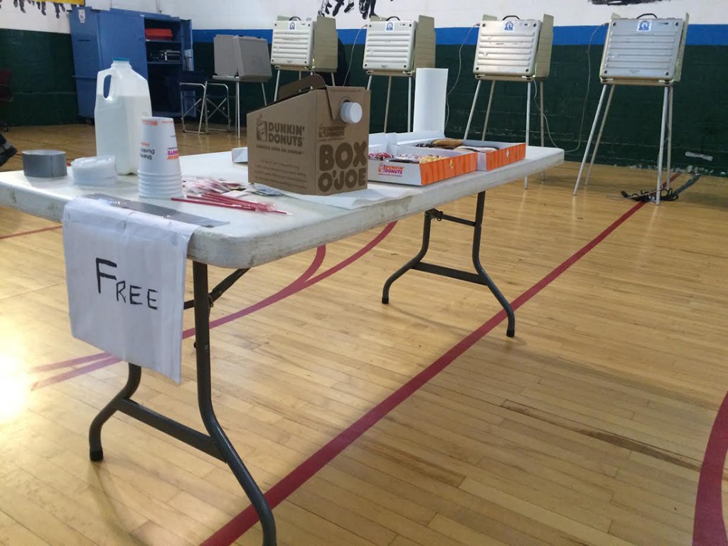A table with free donuts and coffee was set up in the middle of a Bridgeport polling station this morning by poll watchers who told voters to vote for Richard Daley Thompson while they were standing within the anti-electioneering “campaign free zone.” 