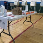 A table with free donuts and coffee was set up in the middle of a Bridgeport polling station this morning by poll watchers who told voters to vote for Richard Daley Thompson while they were standing within the anti-electioneering “campaign free zone.” 