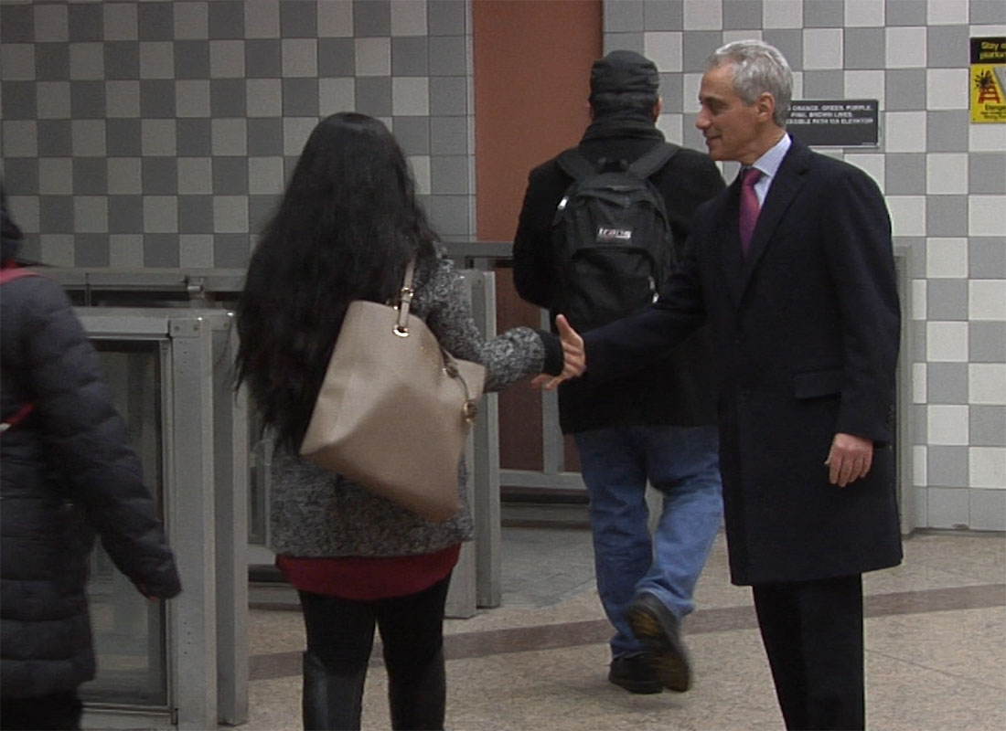 Rahm Emanuel shakes hands at the Clark and Lake CTA stop, Wednesday, February 25, 2015
