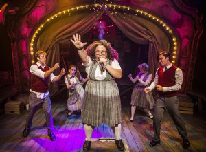Dead choir member Constance Blackwood (Lillian Castillo) sings Sugarcloud about her love for life and her hometown. Confetti falls over one of the most upbeat songs in the show. (Courtesy of Liz Lauren/ Chicago Shakespeare Theater)