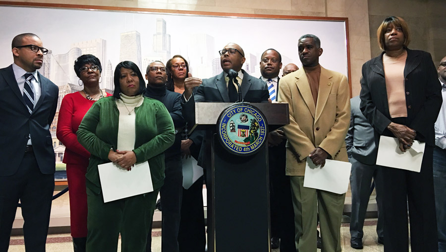 Members of the City Council Black Caucus meet with media on Wednesday.