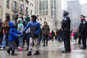 Police line the streets as protesters march on Michigan Avenue