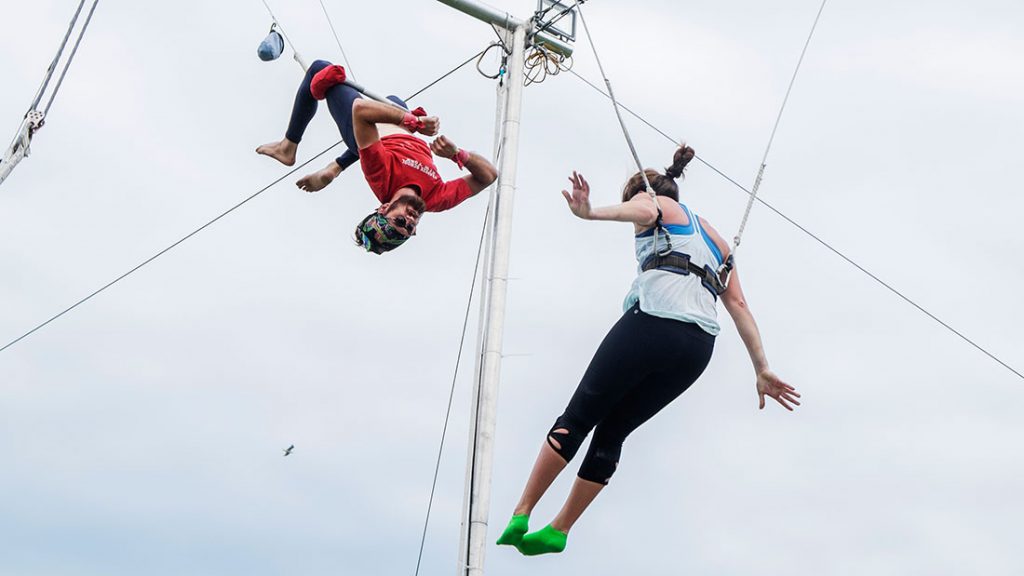 Instructor and student on trapeze