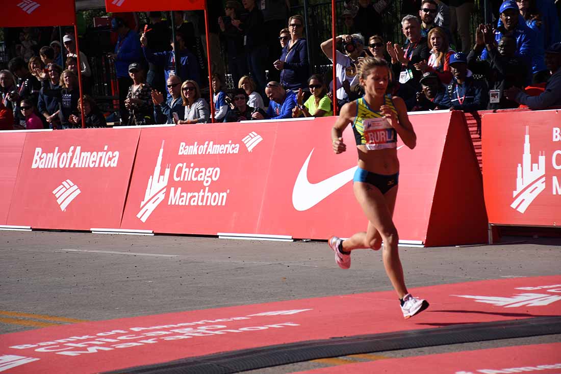Serena Burla crossing the finish line at the Chicago Marathon on Oct. 9, 2016.