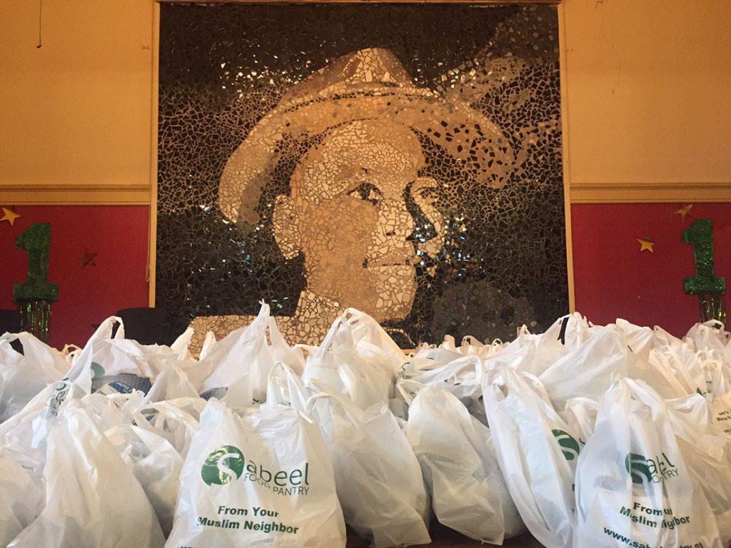 The Muslim Turkey Drive has been able to meet its goal of feeding 5,000 families in south of Chicago. Organizers gathered at Emmett Till school to prepare the turkeys to distribute among schools on Nov. 22. (Medill/Fariba Pajooh)