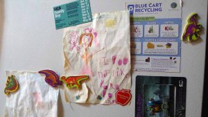 An expressive piece of art by Panko’s daughter, sums up the pain of domestic violence. It says, “I do not like Dora.”