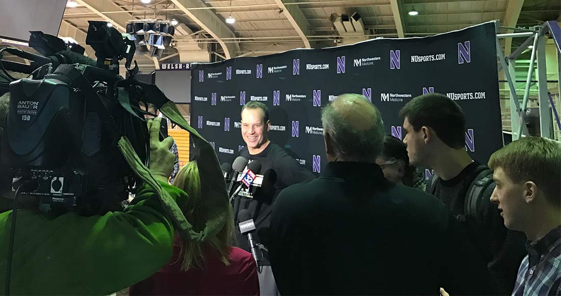 Northwestern basketball head coach Chris Collins answers questions at team press conference in Welsh-Ryan Arena.