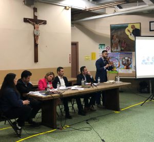 Hilario Dominguez and the four other candidates vying to become the next 25th ward alderman attend a housing forum in January. 